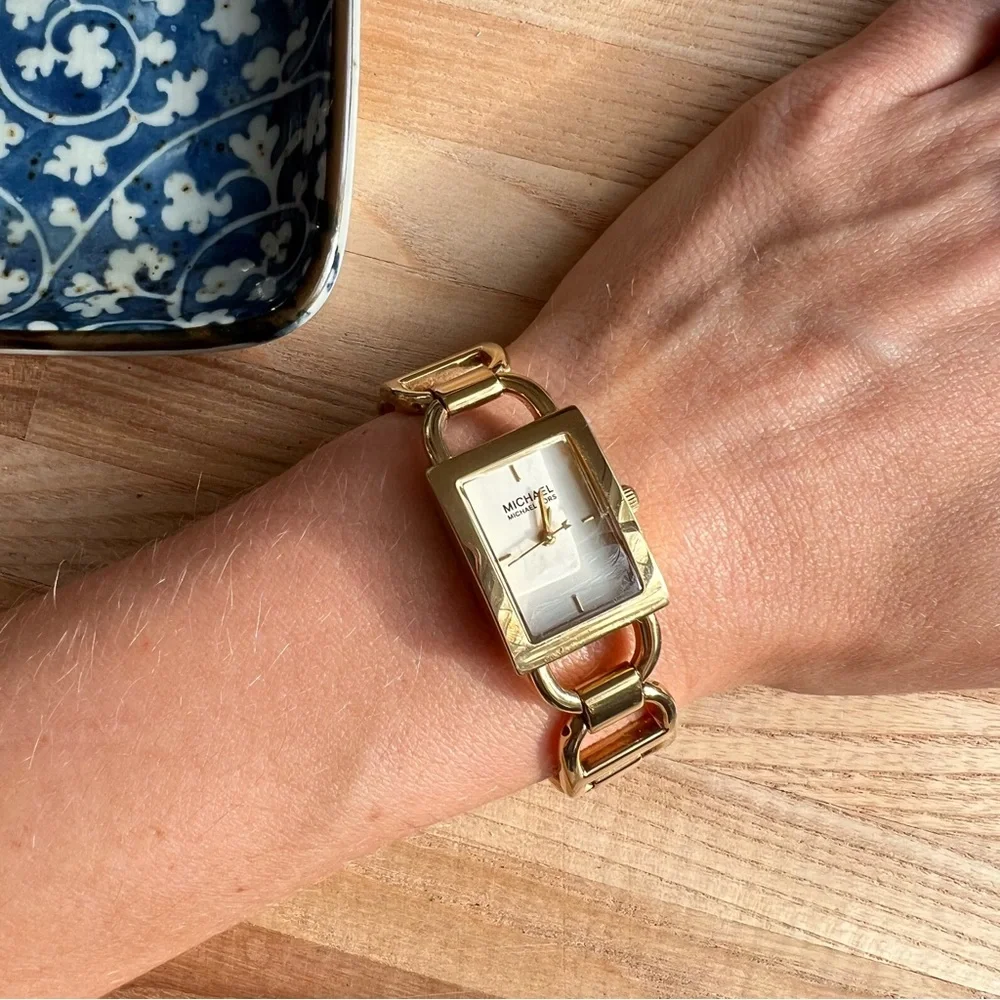 Michael Kors ladies rectangular gold tone bracelet dress watch NEW BATTERY